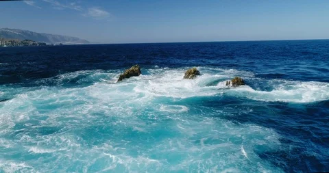 4k Slowmotion drone shot of powerful ocean waves crashing rocks in Tenerife Stock Footage 90304680
