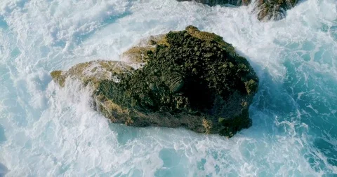 4k Slowmotion drone shot of powerful ocean waves crashing rocks in Tenerife Stock Footage 90306104
