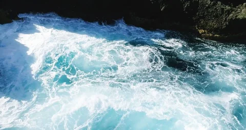 4k Slowmotion drone shot of powerful ocean waves crashing rocks in Tenerife Stock Footage 90306269