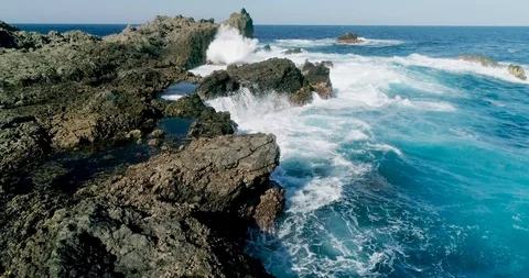 4k Slowmotion drone shot of powerful ocean waves crashing rocks in Tenerife 스톡 동영상 90307458