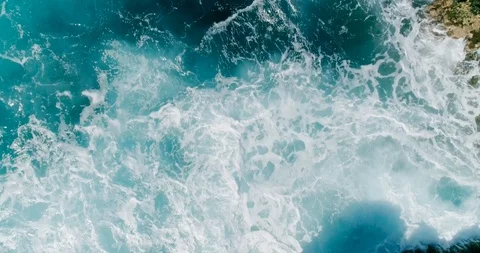 4k Slowmotion drone shot of powerful ocean waves crashing rocks in Tenerife Stock Footage 90308680