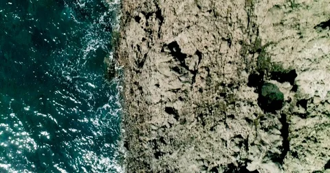 4k Slowmotion drone shot of powerful ocean waves crashing rocks in Tenerife Stock Footage 90308776