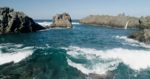 4k Slowmotion drone shot of powerful ocean waves crashing rocks in Tenerife Stock Footage 90309000