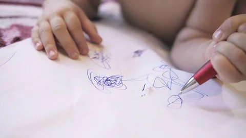 4K small child draws with a pen, close up Stock Footage 110892914