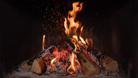 4K - A small fire with sparks in the fireplace Stock Footage 281028304
