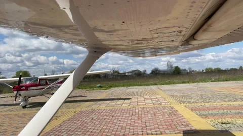 4k Small plane back to the parking place after landing. Stock Footage 155587937