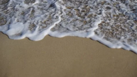4k Small wave, Soft wave on sand beach for opening video, text space. Stock Footage 231713126