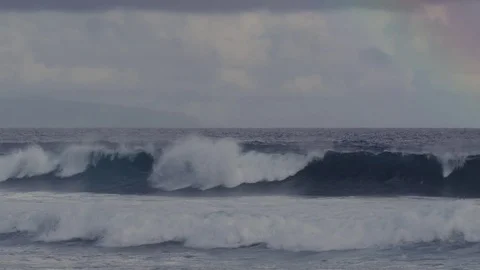 4K: Small Waves With Wave/Foam Particales Spraying Foreground Stock Footage 72681224