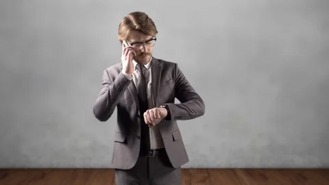 4K Smart Looking Business Man on Mobile, Professional Glasses and Suit Stock Footage 76140036