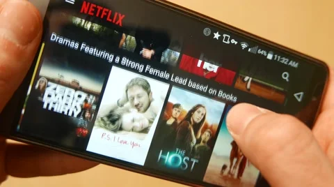 4K Smartphone Netflix Application Closeup Browsing Movies To Watch Stock Footage 59037624