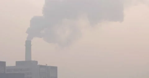 4K - Smoke Stack Blows Smoke on a Heavy Pollution Day in China Stock Footage 57411745
