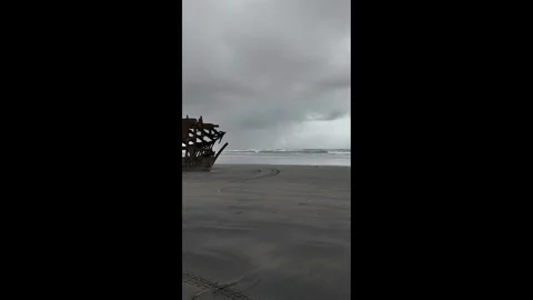 4K smooth stabilized footage of the Peter Iredale shipwreck in Fort Stevens, OR Stock Footage 328986362