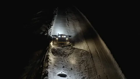 4k. Snow grooming machine on a ski slope at night Stock Footage 161257154