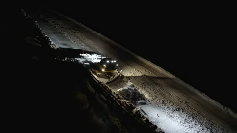 4k. Snow grooming machine on a ski slope at night Stock Footage 161257963