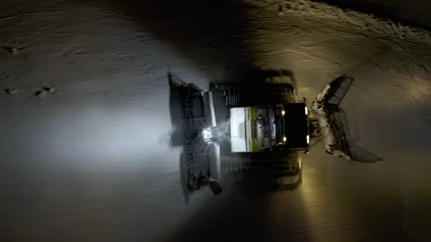 4k. Snow grooming machine on a ski slope at night Stock Footage 161259960