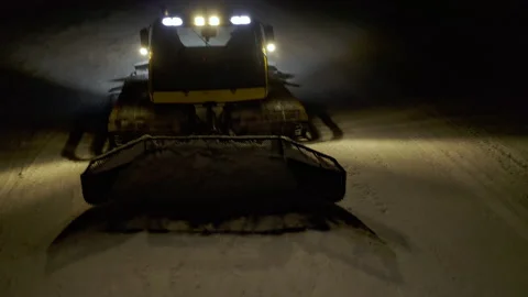 4k. Snow grooming machine on a ski slope at night Stock Footage 161266408
