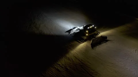4k. Snow grooming machine on a ski slope at night Stock Footage 161266471