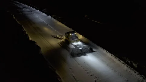 4k. Snow grooming machine on a ski slope at night Stock Footage 161269245
