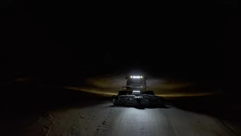 4k. Snow grooming machine on a ski slope at night Stock Footage 161274795