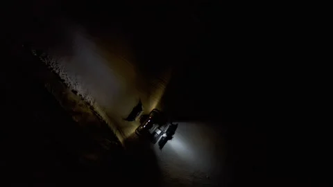 4k. Snow grooming machine on a ski slope at night Stock Footage 161275223