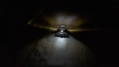 4k. Snow grooming machine on a ski slope at night Stock Footage 161275434