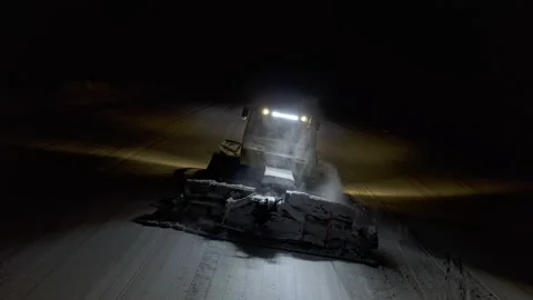 4k. Snow grooming machine on a ski slope at night Stock Footage 161279827