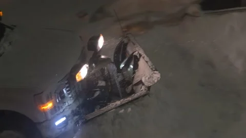 4K Snow plow clears road during winter blizzard storm Stock Footage 170627463