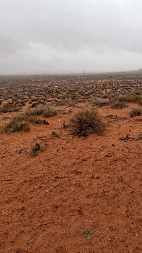 4K Snowfall Over Red Desert Landscape Rare Winter Weather Arizona Stock Footage 330794270