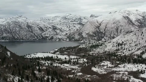 4k Snowy Mountain Lake Aerial Drone View Stock Footage