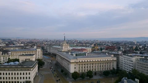 4K Sofia Bulgaria Drone Sunrise Bulgarian Flag on Flagpole Flys in Wind Stock Footage 122462069