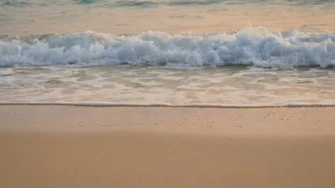 4K. soft wave of the sea , clear water on the white sand beach. Stock Footage 132646583
