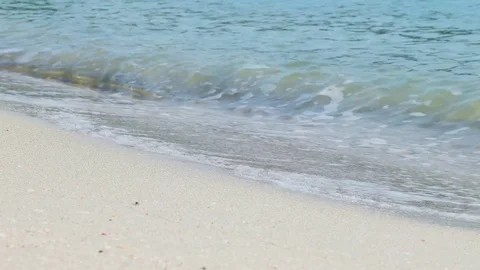 4k Soft wave of the sea on the light beach Stock Footage 79000875
