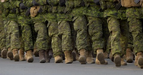 4K - Soldiers with weapons marching in formation Stock Footage 223747030