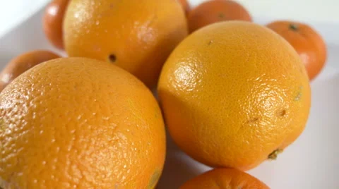 4K - Some oranges on a plate Stock Footage 48267441