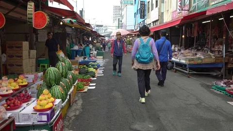 4K South Korean Seller Jagalchi Market. Selling Vegetables, Fruits in Busan-Dan Stock Footage