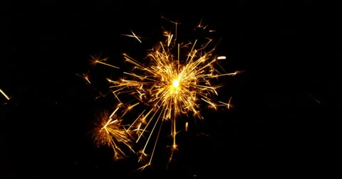 4K - Sparkler over Black Background Видео 43020489