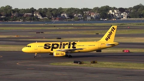 4K Spirit Airlines yellow taxi cab color plane Stock Footage