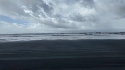 4K stabilized footage from the driver's perspective of driving on sand beach USA Video stock 328986034