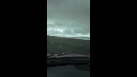 4K stabilized footage from the driver's perspective of driving on sand beach USA Video stock 328986037