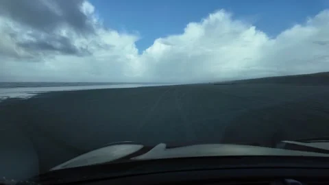 4K stabilized footage from the driver's perspective of driving on sand beach USA 스톡 동영상 328986073