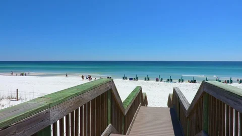4K Stairs Down to White Sandy Beach Full of People Stock Footage 109229053