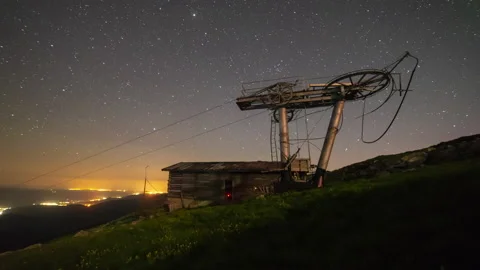 4K Starry night above old decrepit ski-lift station in the mountains, Chopok, Stock Footage 146751099