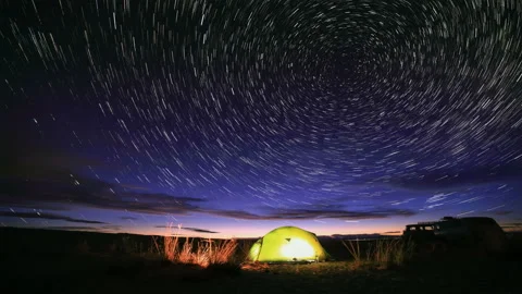 4K. Starry Night over the clouds over the lake Khar-Us Nuur, Mongolia. Ultra  Stock Footage 107023930