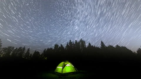 4k startrails timelapse with tent under starry night sky. Stock Footage 161491033
