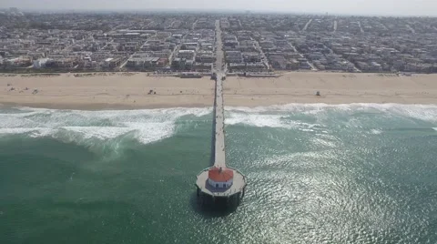 4k Static aerial view of Manhattan Beach shore and pier Stock Footage 64657506
