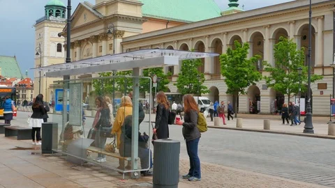 4K Static Shot of Bus Traffic and Public Transport Bus Shelter City Urban Travel Stock Footage