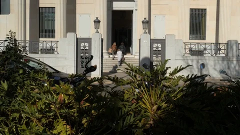 4k static shot of the entrance of a monumental historical art deco building Stock Footage 123797168