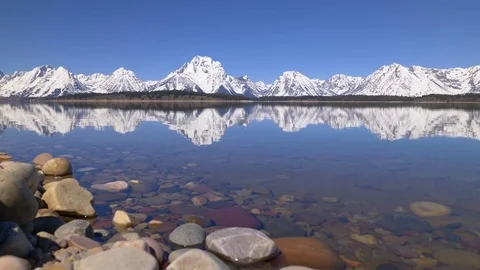 4K static shot of Jackson Lake and Grand Teton mountains Stock Footage 75543137