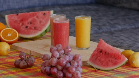 4K Static view of fruit and juices platter. Colorful shot Stock Footage 112028510