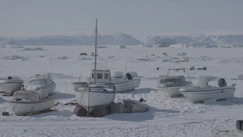 4K Still Image of Boats Stranded on Frozen Arctic Shore Stock Footage 314515111